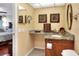 Cozy bathroom featuring granite countertops and decorative artwork at 2203 Starboard, Winter Haven, FL 33881