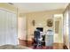 Bedroom featuring a built in desk and access to the ensuite bathroom at 2203 Starboard, Winter Haven, FL 33881
