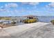 Waterfront dock and boat house featuring boat launch and access to the open water at 2203 Starboard, Winter Haven, FL 33881