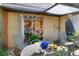 Covered patio with comfortable seating and a view of the garden at 2203 Starboard, Winter Haven, FL 33881