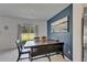 Dining area featuring a wooden table, and view of the backyard at 2244 Teneroc Trl, Lakeland, FL 33801