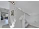 Bright hallway with white walls and staircase leading to the second floor at 2244 Teneroc Trl, Lakeland, FL 33801