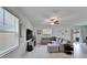 Comfortable living room with sectional sofa, modern decor, and plenty of natural light at 2244 Teneroc Trl, Lakeland, FL 33801