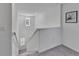 Bright and airy staircase landing with natural light at 2244 Teneroc Trl, Lakeland, FL 33801