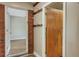 Hallway features brick accent wall and views into the house at 2632 Handley Blvd, Lakeland, FL 33803