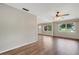 Open living room featuring wood-look flooring and lots of natural light at 2632 Handley Blvd, Lakeland, FL 33803
