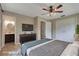 Bright bedroom with a ceiling fan, a bathroom, and closet access at 2632 Handley Blvd, Lakeland, FL 33803