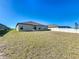 The expansive backyard is newly sodded and features a full, privacy fence at 2929 Flying Blackbird Rd, Bartow, FL 33830