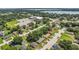 Neighborhood aerial shot showcasing the home's location with a park, lake, and community center nearby at 3016 Reiter Dr, Auburndale, FL 33823