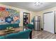Dining area includes stainless steel refrigerator with access to laundry room at 3016 Reiter Dr, Auburndale, FL 33823