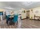 Bright dining area with table, stylish chairs, and kitchen access at 3016 Reiter Dr, Auburndale, FL 33823