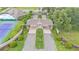 Elegant community entrance gate with meticulously manicured landscaping and secure access at 3121 Highlands By The Lake Way, Lakeland, FL 33812