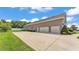 Spacious home with three-car garage and a long driveway at 3121 Highlands By The Lake Way, Lakeland, FL 33812