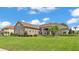 Beautiful home with well-maintained landscaping and a charming front facade at 3121 Highlands By The Lake Way, Lakeland, FL 33812