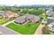 Attractive front yard with healthy lawn, mature trees, and manicured plantings enhancing the home's appeal at 3121 Highlands By The Lake Way, Lakeland, FL 33812