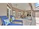Covered lanai with comfortable seating perfect for enjoying the outdoors all year long at 3121 Highlands By The Lake Way, Lakeland, FL 33812
