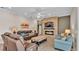 Comfortable living room features fireplace, modern furniture and bright lighting at 3121 Highlands By The Lake Way, Lakeland, FL 33812