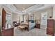 Spacious main bedroom features tray ceiling, four poster bed, and lots of light at 3121 Highlands By The Lake Way, Lakeland, FL 33812