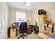 Cozy room featuring a desk, packed boxes, and ample storage, ready for personalization and organization at 322 Ne 9Th St, Mulberry, FL 33860
