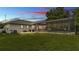 This home features a spacious backyard with a screened-in pool and outdoor dining area for entertaining at 535 N Todhunter Way, Lake Alfred, FL 33850