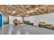 Basement with exposed ceiling, concrete floor, and ample storage space at 535 N Todhunter Way, Lake Alfred, FL 33850