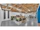 Large basement featuring exposed ceiling, concrete floor, and shelving at 535 N Todhunter Way, Lake Alfred, FL 33850