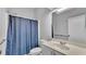 Cozy bathroom with a shower and updated vanity at 535 N Todhunter Way, Lake Alfred, FL 33850