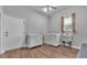 Laundry room features a washer, dryer, sink, and ample storage at 535 N Todhunter Way, Lake Alfred, FL 33850