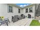 Cozy outdoor patio with comfortable seating, perfect for relaxing and entertaining in style at 535 N Todhunter Way, Lake Alfred, FL 33850