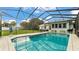 Private pool with screen enclosure offers clear water, comfortable seating, and peaceful backyard views at 535 N Todhunter Way, Lake Alfred, FL 33850