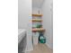 Laundry area with storage shelves at 546 Scott Lake Creek Ln, Lakeland, FL 33813