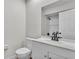 Bright bathroom with a mirror, new vanity, faucet, toilet and shower at 6 Rosewood Dr, Davenport, FL 33837