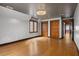 Spacious bedroom with gleaming hardwood floors, diamond pane window, and large closet at 6001 Sweet Gum Run, Bartow, FL 33830
