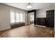 Bright bedroom with wood floors, a large window, and a built-in closet at 6001 Sweet Gum Run, Bartow, FL 33830