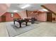 Finished attic space featuring a pool table, lighting, and natural light at 6001 Sweet Gum Run, Bartow, FL 33830