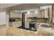 Granite kitchen featuring stainless steel appliances at 6001 Sweet Gum Run, Bartow, FL 33830