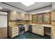 Well-equipped kitchen featuring stainless steel appliances and granite counters at 6001 Sweet Gum Run, Bartow, FL 33830