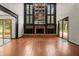 Bright living room featuring a fireplace and large windows at 6001 Sweet Gum Run, Bartow, FL 33830