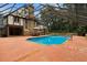 Enclosed pool with screened enclosure, spa, and beautiful backyard Tudor home at 6001 Sweet Gum Run, Bartow, FL 33830