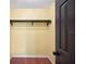 Walk-in closet with wood floors and a rod for hanging clothes, providing storage at 6281 Halabrin Rd, Haines City, FL 33844
