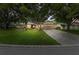 Beautiful home with manicured lawn and large trees at 6342 Butternut Dr, Lakeland, FL 33813