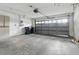 Spacious garage with an automatic door and built-in storage cabinets at 6342 Butternut Dr, Lakeland, FL 33813