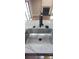 Stainless steel kitchen sink with modern black faucet and white marble countertop at 6342 Butternut Dr, Lakeland, FL 33813