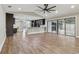 The home has an open floor plan with the kitchen flowing into the living room with lots of natural light at 6342 Butternut Dr, Lakeland, FL 33813