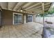 Covered patio leading to the backyard offering ample space for outdoor entertainment at 6342 Butternut Dr, Lakeland, FL 33813