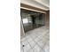The home features a large sliding glass door onto a tiled patio at 6342 Butternut Dr, Lakeland, FL 33813