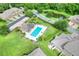 Aerial view of the community pool and surrounding townhomes at 6415 Torrington Cir, Lakeland, FL 33811