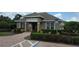 Charming community building with inviting entrance, well-maintained landscaping, and accessible parking at 6415 Torrington Cir, Lakeland, FL 33811