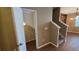 Hallway with hardwood style flooring and stairway to the second floor at 6415 Torrington Cir, Lakeland, FL 33811