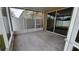 Outdoor screened patio with access to the home and the backyard at 6415 Torrington Cir, Lakeland, FL 33811